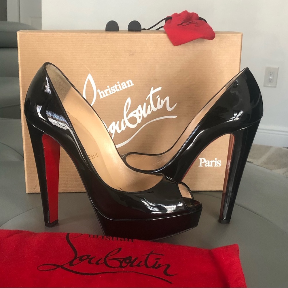 Authentic Christian Louboutin slightly worn.